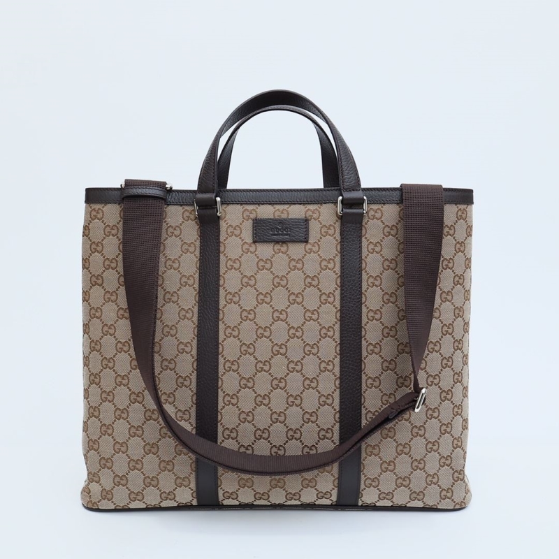 G*u*i shopping bags